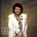 06-12-1989 Hans Bouwens als George Baker in studio te Amsterdam Photo: Govert de Roos/Connu

[keywords]Posed, Eyecontact, Swimmingpool[/keywords]